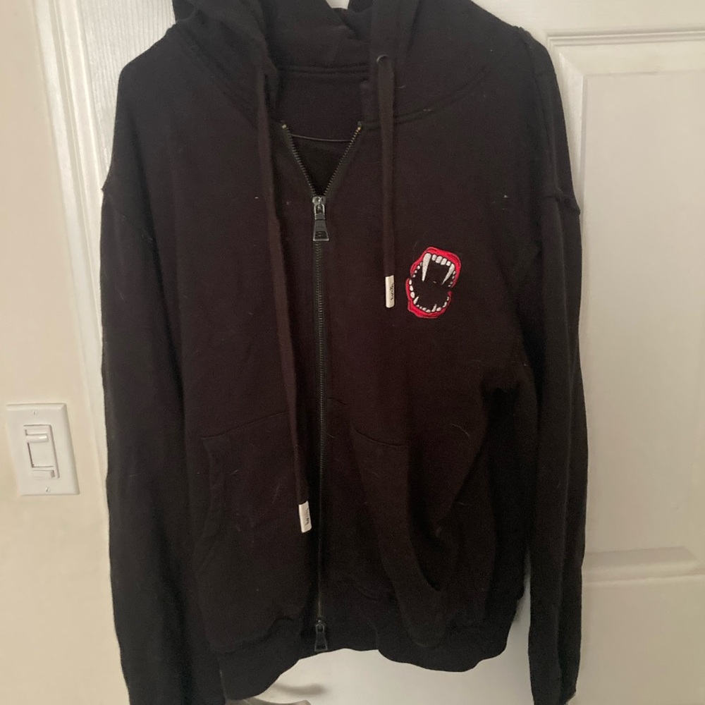 Haculla hoodie with embroidered fang patch